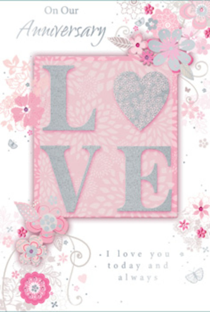 An open view of this anniversary card reveals a design that feels as welcoming and warm as stepping into a sunlit room in Tadworth, where a fresh bouquet rests on the table. The main motif on the card's front is the word LOVE, printed in generously sized letters and finished with frosted glitter that sparkles softly rather than boldly. The glitter sits on raised lettering, creating a gentle ridge you can feel when you run a finger across it, evoking the sensation of tracing along the textured edges of flower petals or decorative ribbon. The colour palette is soothing and romantic: soft blush pink, hints of lilac-grey, creamy ivory, and touches of silver shimmer. Along the card's borders and corners, wispy, hand-drawn blossoms drift in loose clusters. These blooms are simple yet expressive, their petals sketched in fine lines with delicate shading that implies depth without becoming heavy. Leaves and filigree lines entwine among the flowers, forming soft sprays that frame the central text rather than compete with it. Here and there, almost-hidden butterflies and tiny swirls appear, like fleeting details you might spot while pausing among gardens or tree-lined paths near Tadworth Court. The background behind the artwork is a gentle, uniform blush pink that emphasises the delicacy of the drawings. Nestled beneath the floral motif, the tender phrase I love you today and always appears in an understated, graceful typeface, its steady lines balancing the more flowing script used elsewhere. The composition feels harmonious, like a well-balanced bouquet with just the right mix of blooms and foliage. It suggests quiet gratitude and enduring affection, making this card a thoughtful companion to anniversary flowers delivered around Tadworth by a caring local florist.